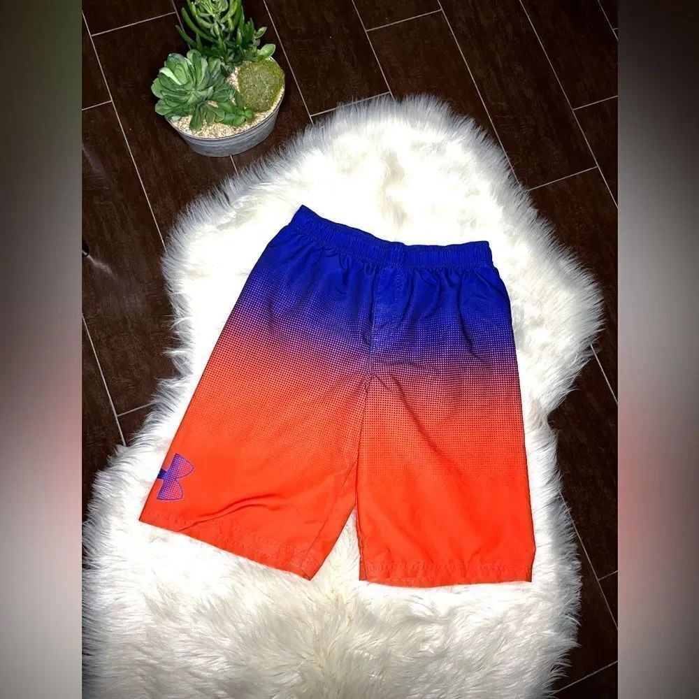 Under Armour Kids' Blue and Orange swim trunks
Sz YXL